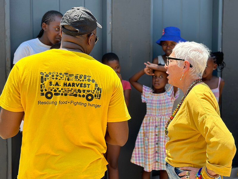 SA_Harvest_s_Victor_Mpofu_sharing_stories_of_rescuing_food_and_fighting_hunger_in_Alexandra_township_with_Ronni_Kahn.jpeg